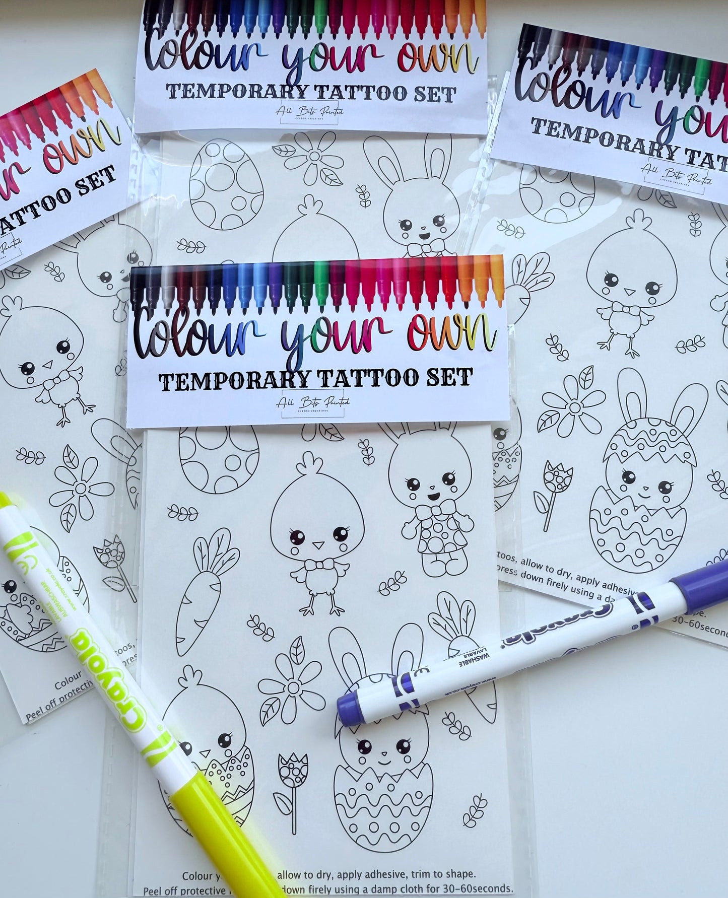 Colorable Easter temporary tattoos with bunny and egg designs for children's holiday activities"
