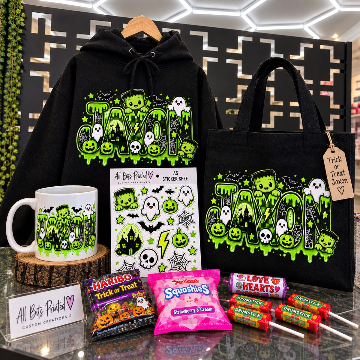 Personalised Halloween trick or treat gift set with hoodie, tote bag, mug, sticker sheet and sweets